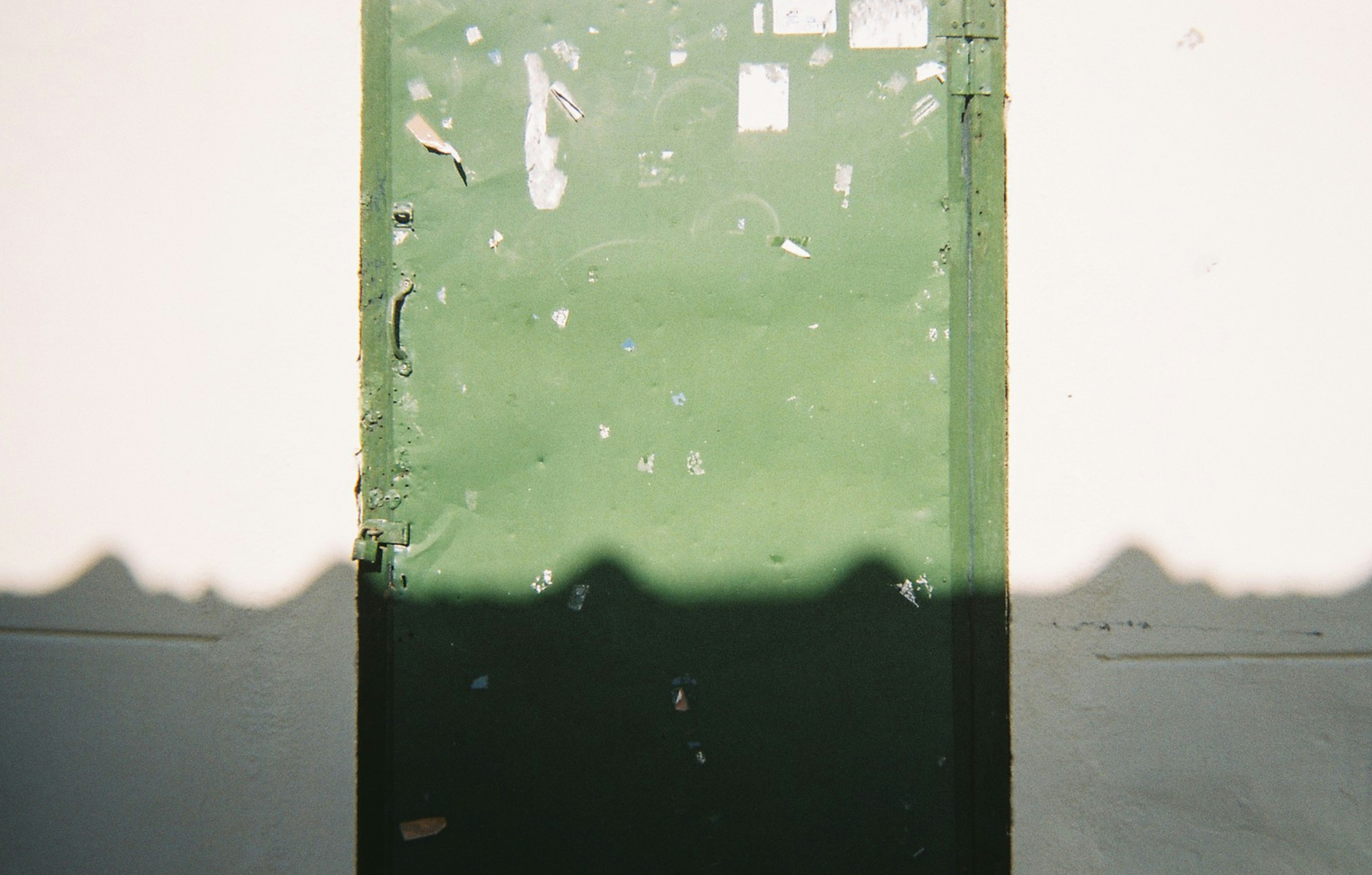 green and black plastic container