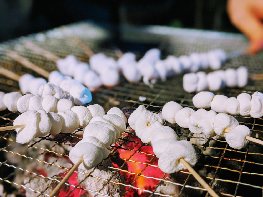 white plastic bottles on brown wooden stick