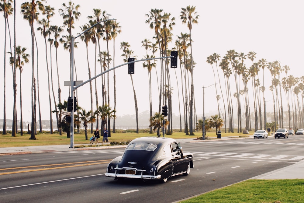 black porsche 911 on road during daytime