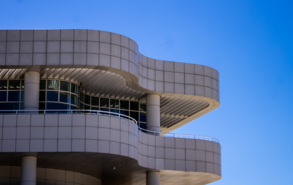 white concrete building under blue sky during daytime