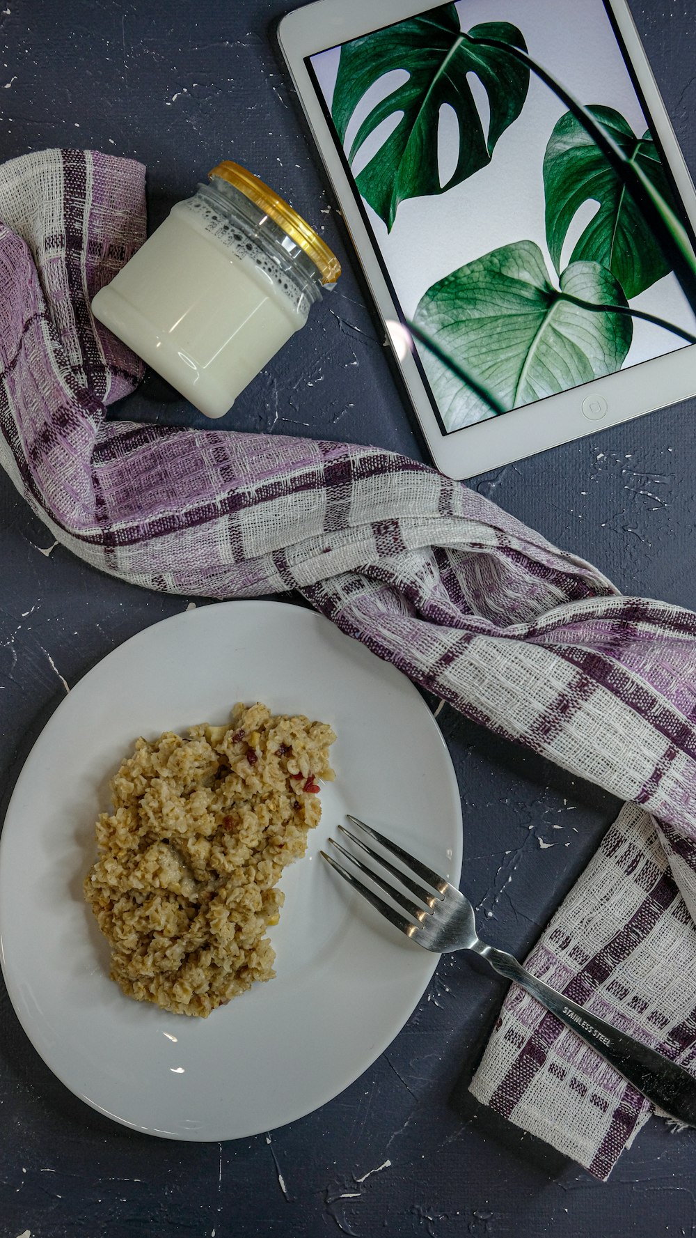 stainless steel fork on white ceramic plate