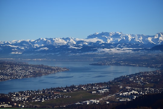 aerial view of snow covered mountains during daytime in Zürich Switzerland