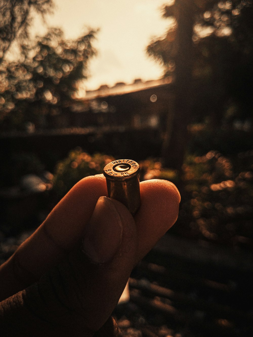 person holding silver and black battery