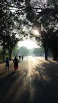 A peaceful early morning scene with children participating in the Early Rising Challenge outdoors.