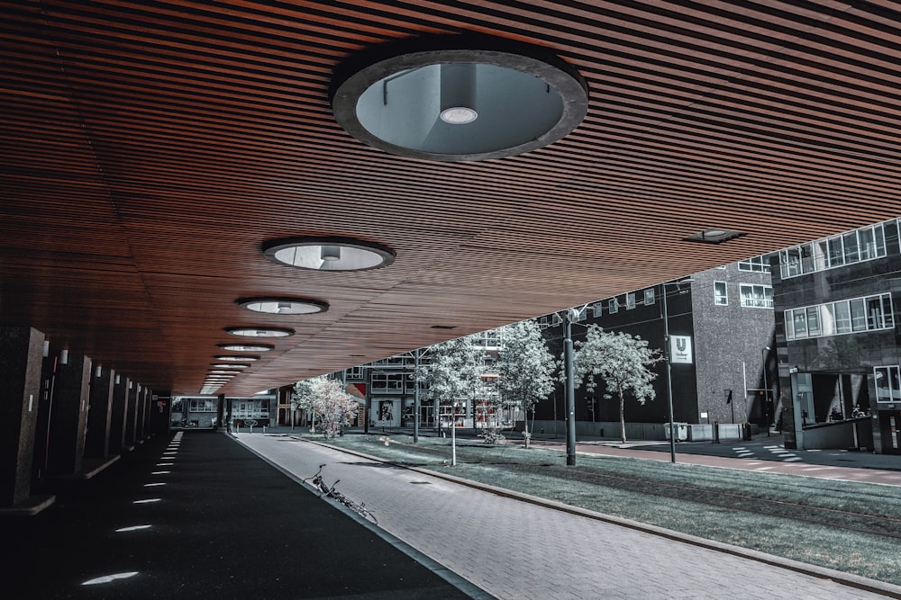 brown brick building near road