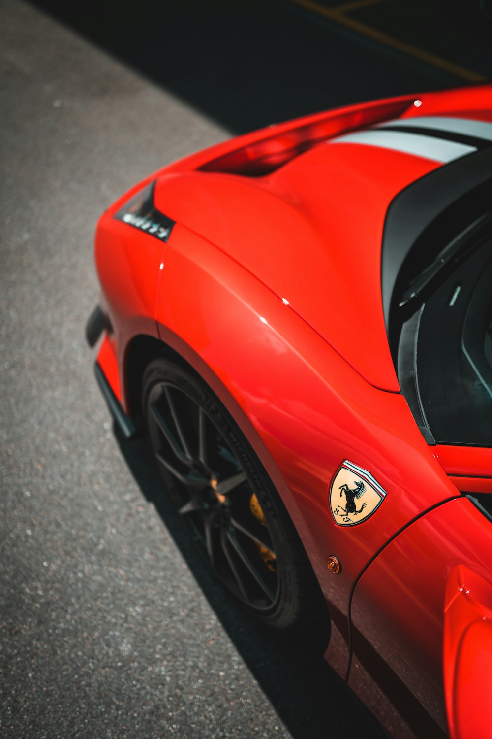 red ferrari 458 italia on road