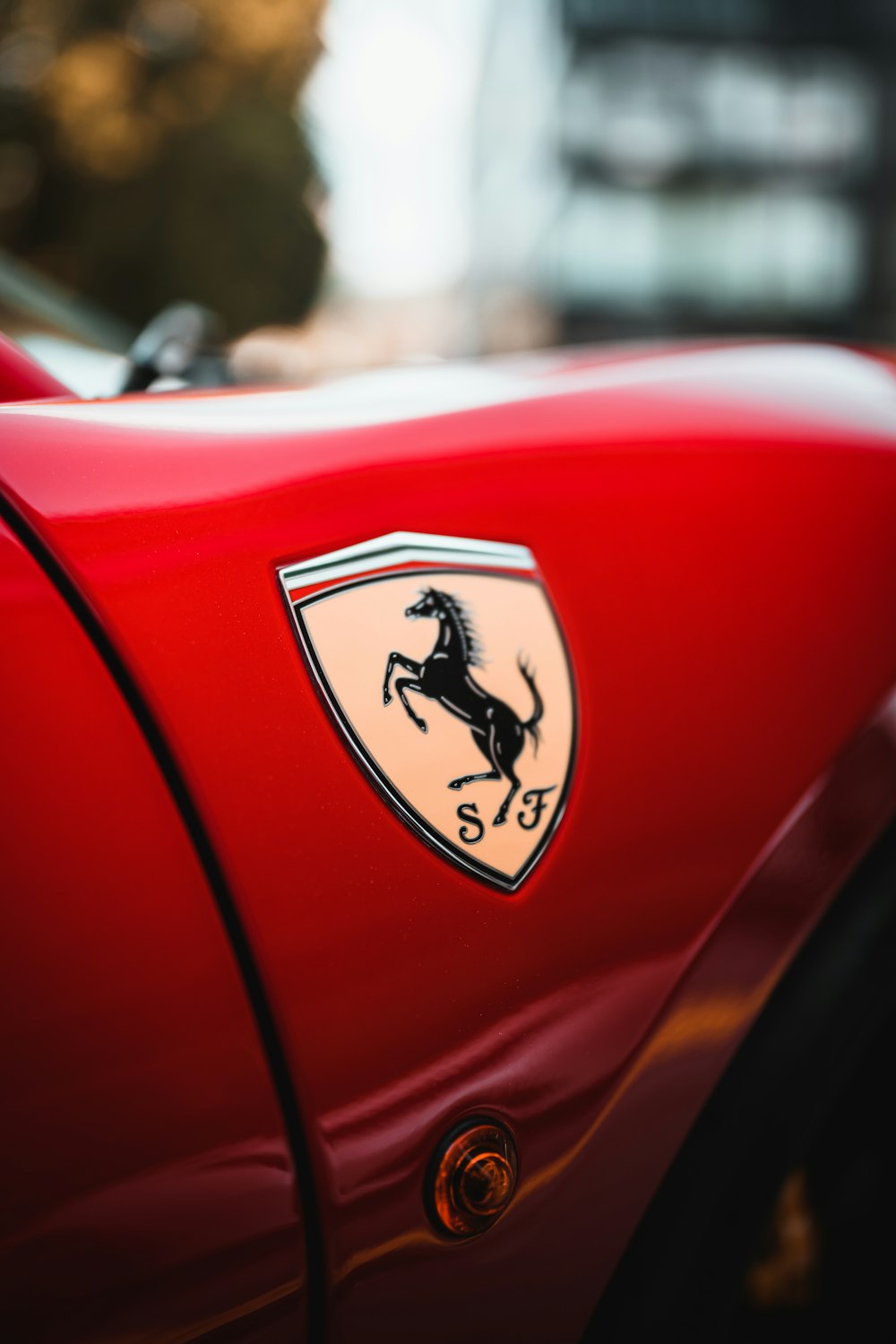 red and yellow car in close up photography