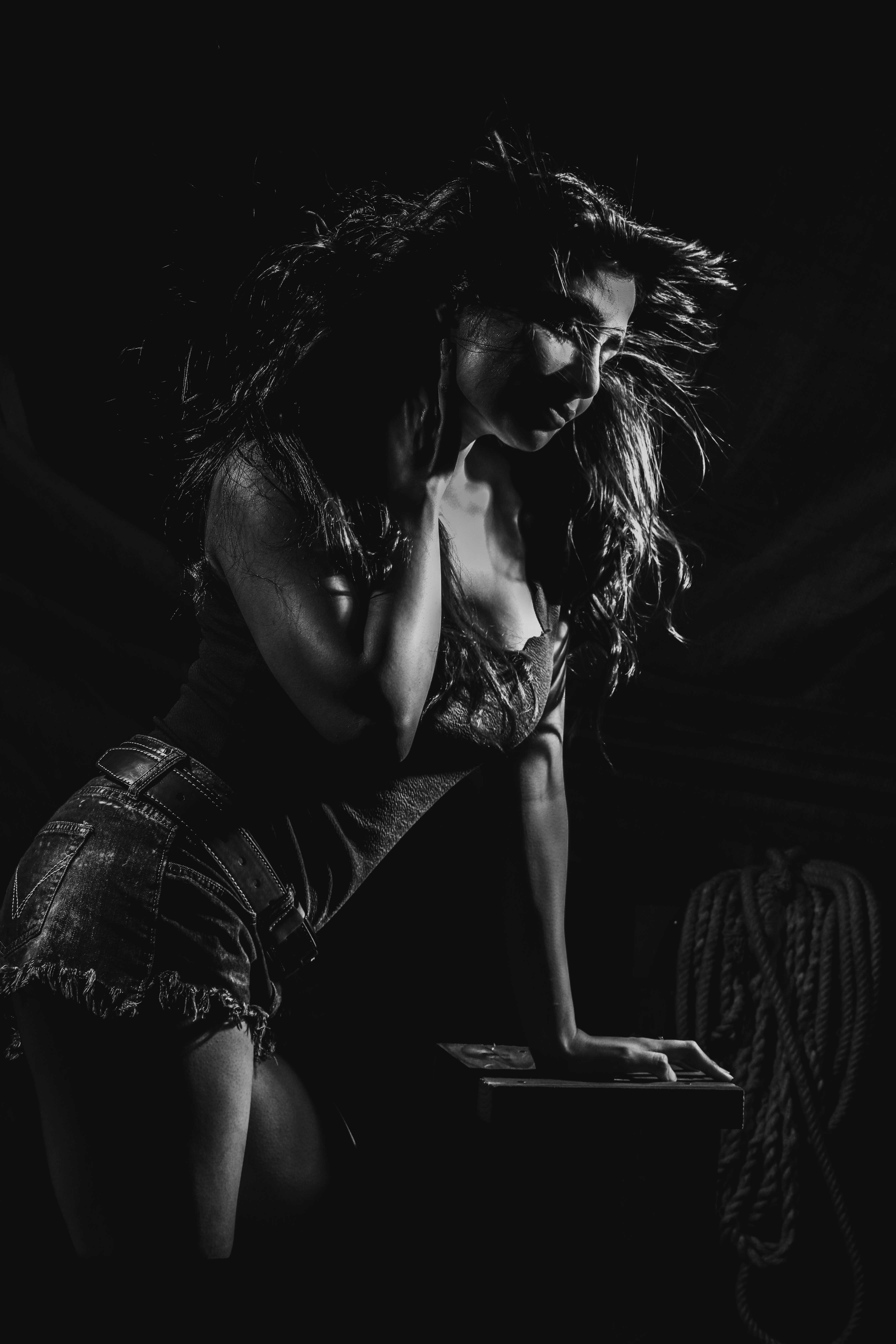 woman in black tank top and denim shorts