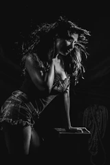 Artistic black-and-white image of flowing hair caught mid-motion.