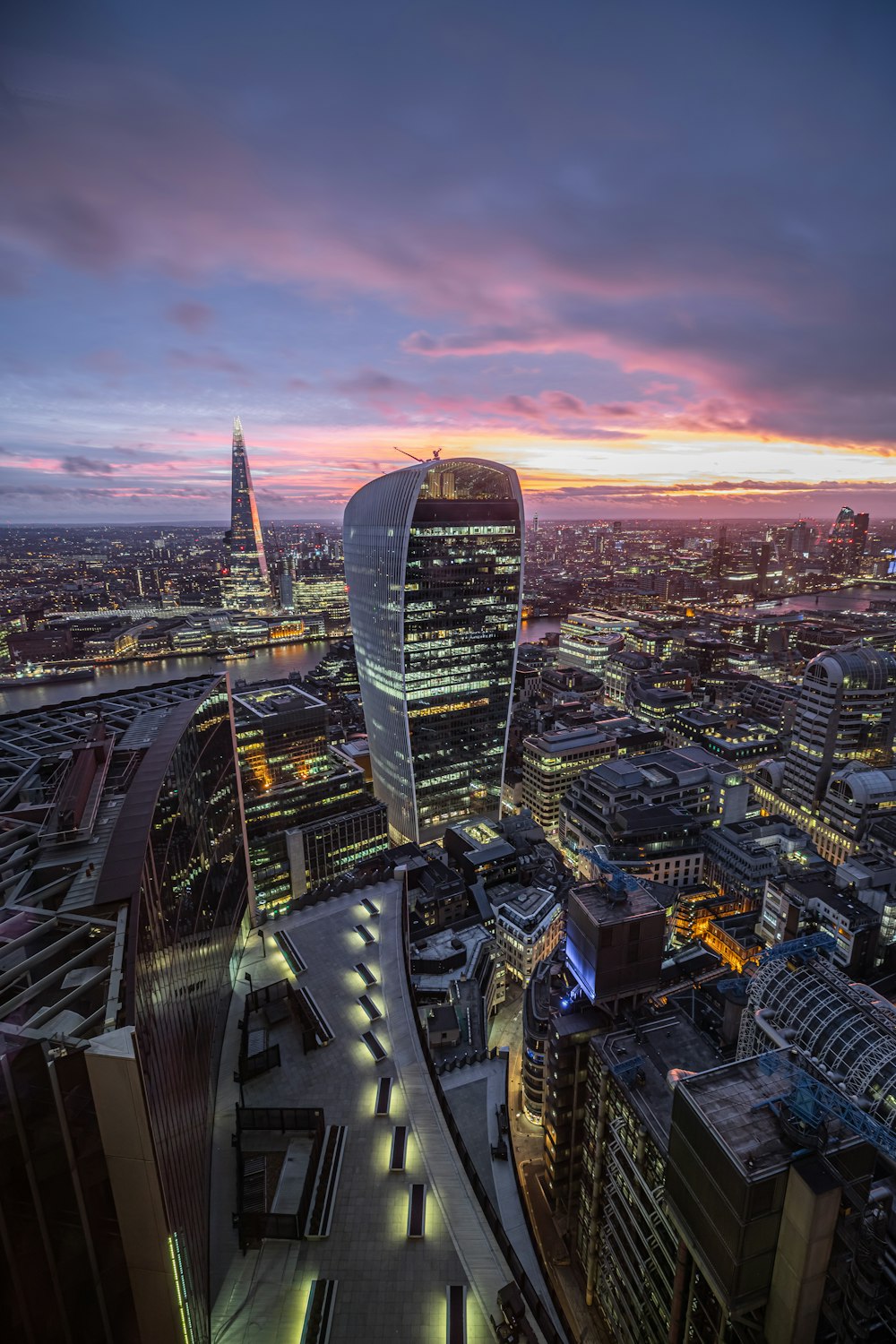 aerial view of city buildings during sunset