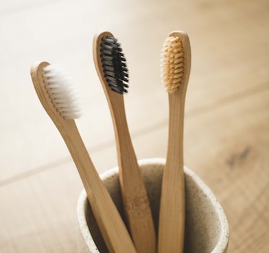 brown wooden sticks in gray ceramic bowl