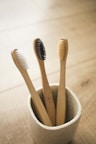 brown wooden sticks in gray ceramic bowl