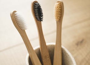 brown wooden sticks in gray ceramic bowl