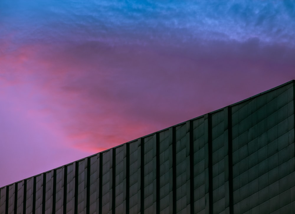 black concrete building under blue sky