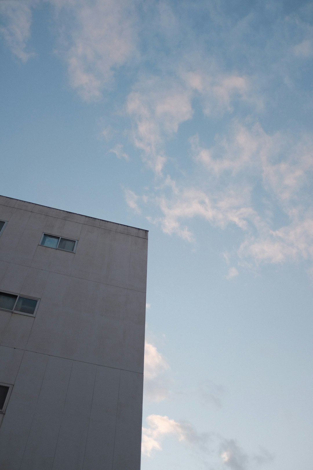 brown concrete building under blue sky during daytime