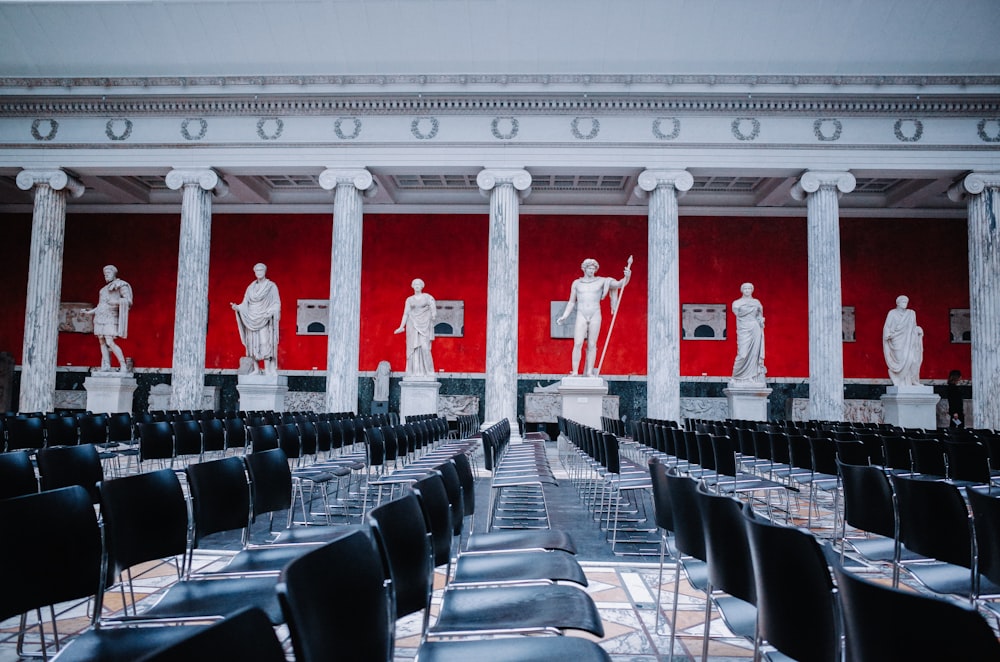 black chairs and tables in a white room