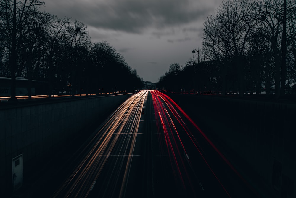 time lapse photography of cars on road during daytime