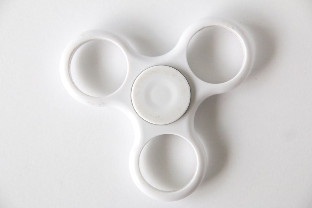 white plastic round frame on white surface