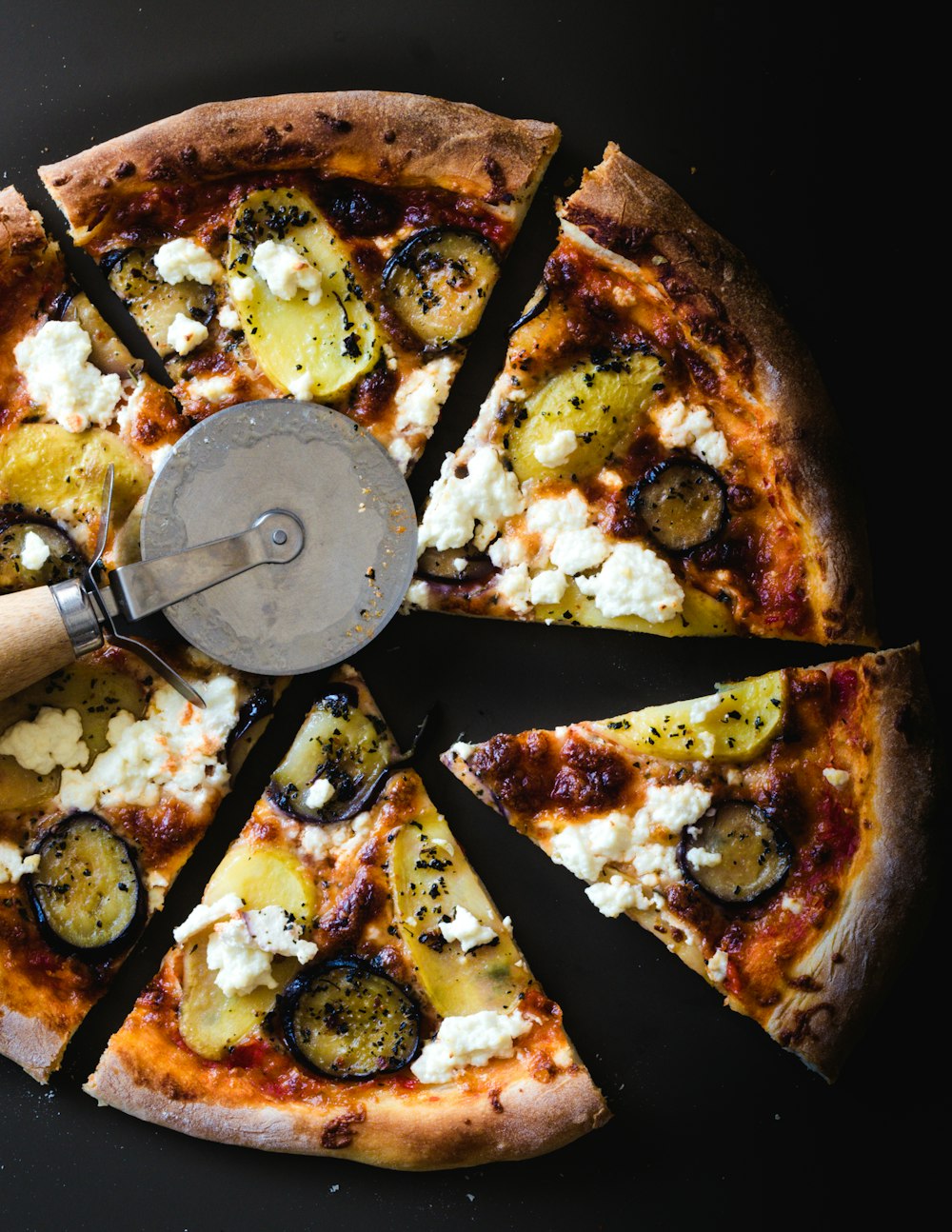 pizza with cheese and green leaf