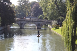 man in yellow jacket riding yellow kayak on river during daytime