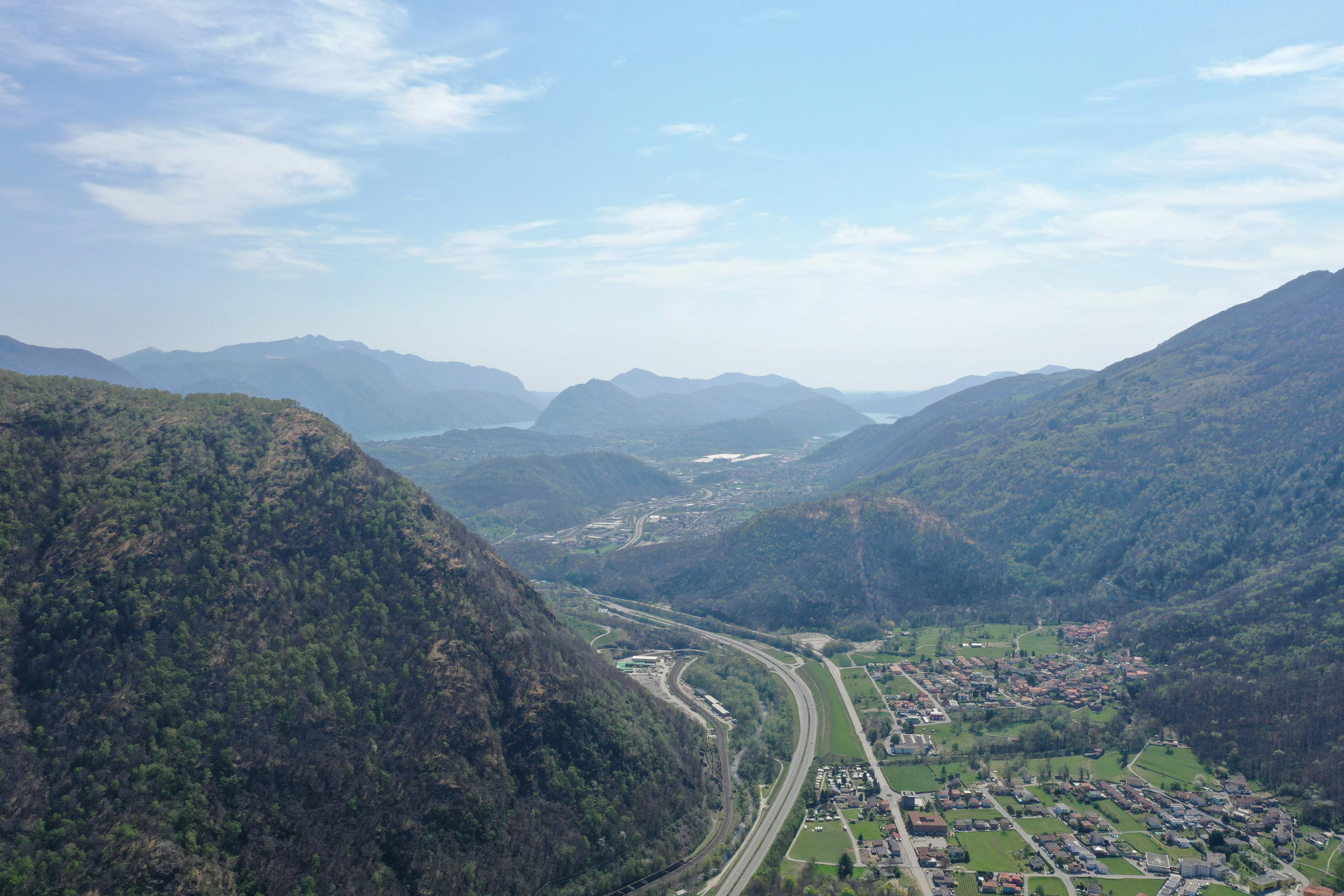 aerial view of city near mountain during daytime