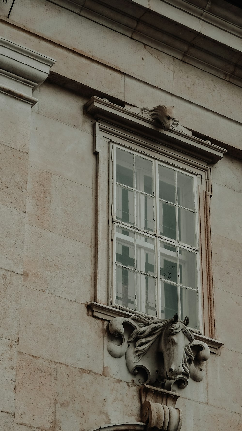 brown wooden framed glass window