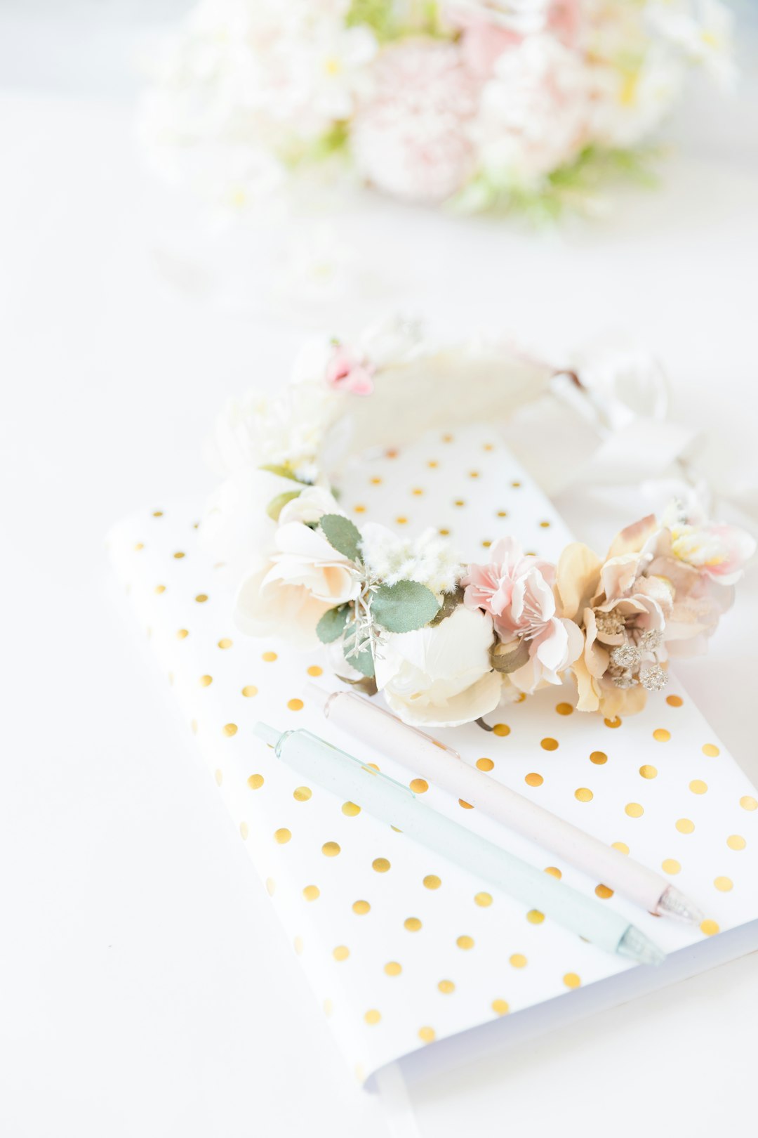 white and pink floral ceramic plate with white and pink floral table cloth