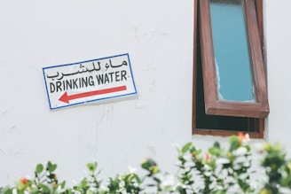 blue and white wooden signage