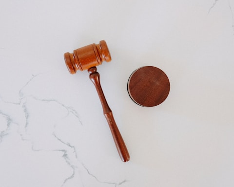 brown wooden smoking pipe on white surface