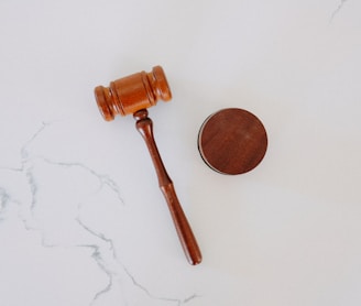 brown wooden smoking pipe on white surface