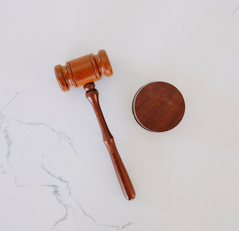 brown wooden smoking pipe on white surface