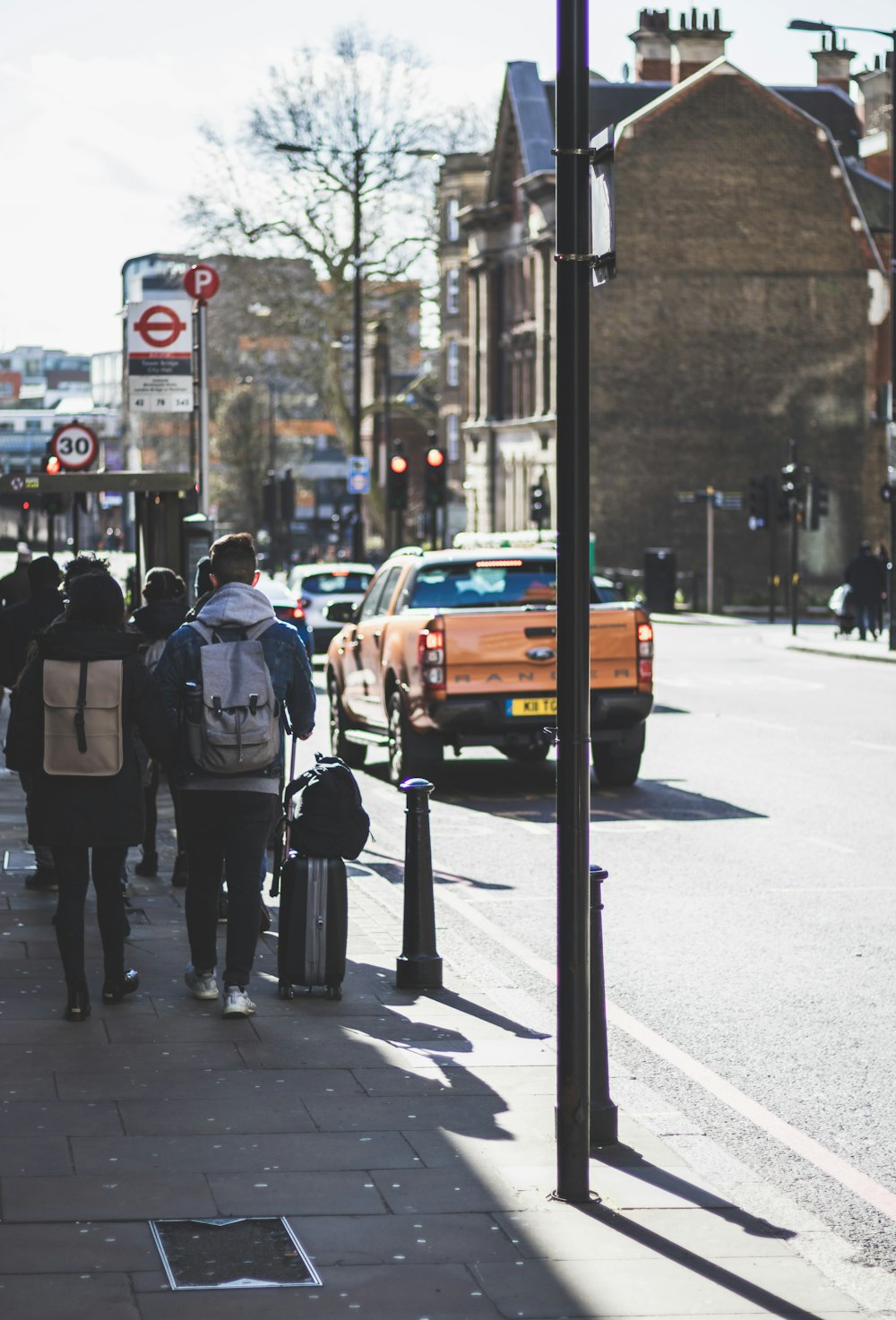 people walking on pedestrian lane during daytime