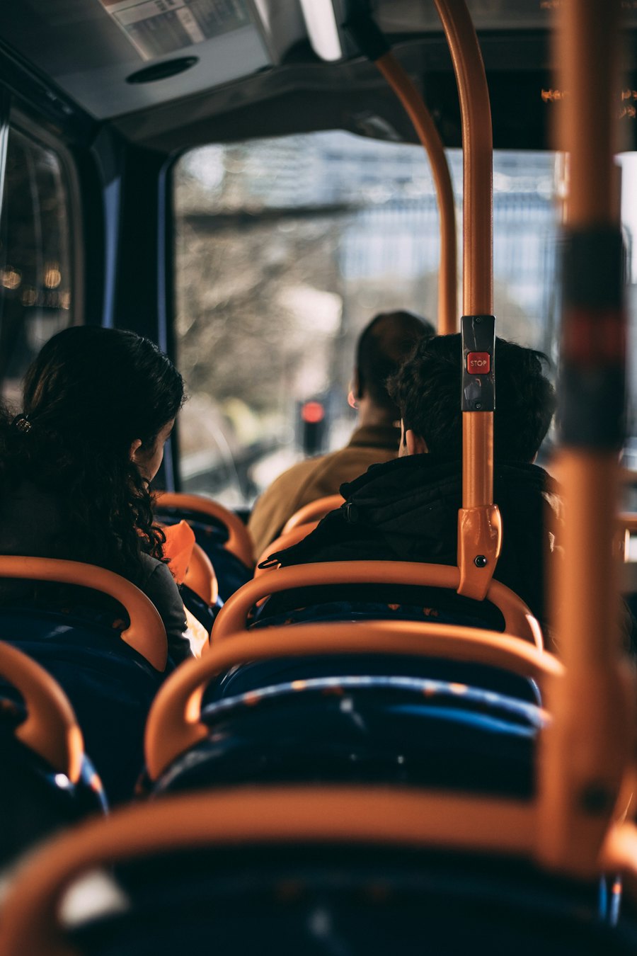 Passengers seated on a bus