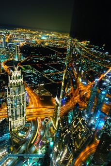 high rise building with lights turned on during night time