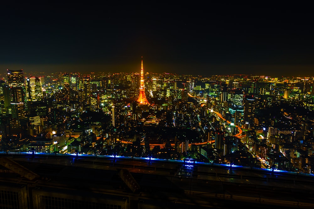 city with high rise buildings during night time