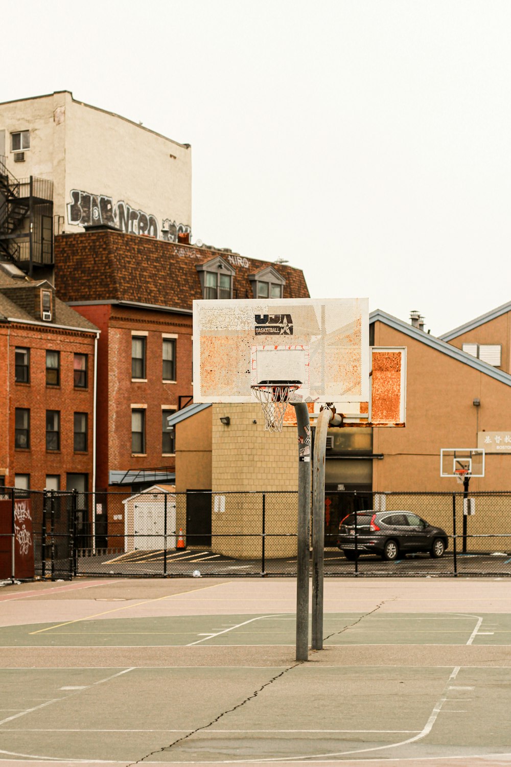 brown and white cardboard box on road