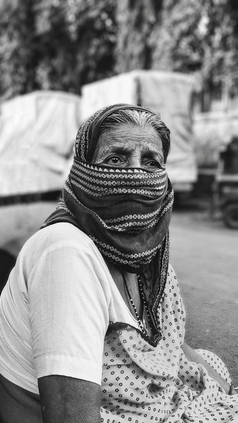 grayscale photo of woman in hijab