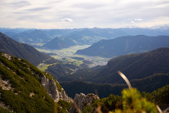 green mountains under white clouds during daytime in Bärenkopf Austria