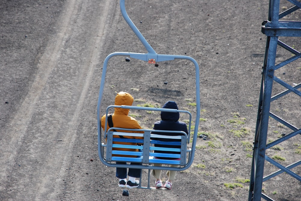 blue and yellow metal chair