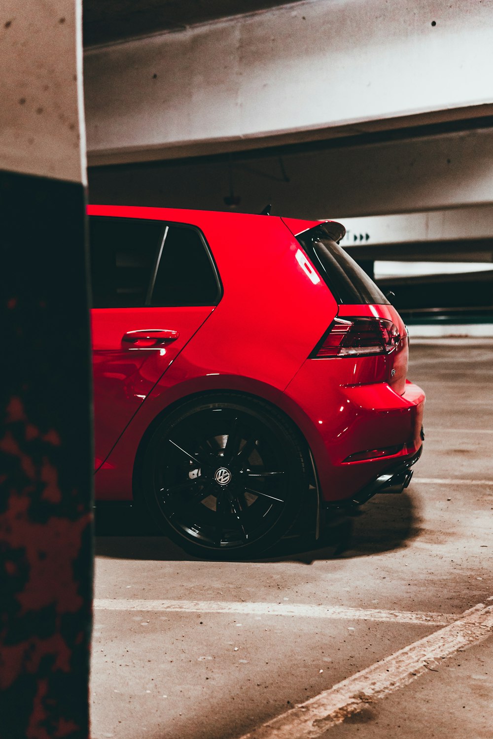 red car parked in parking lot