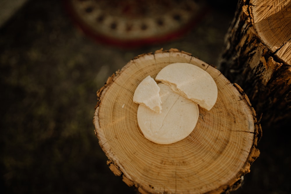 white sliced bread on brown wooden round plate