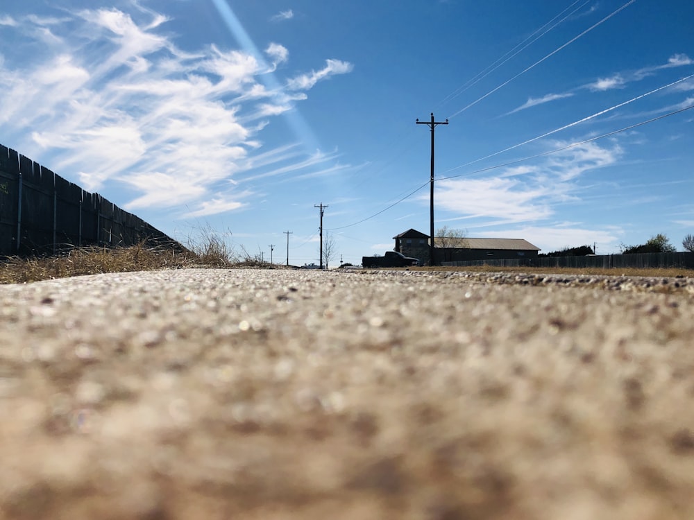 train rail under blue sky during daytime