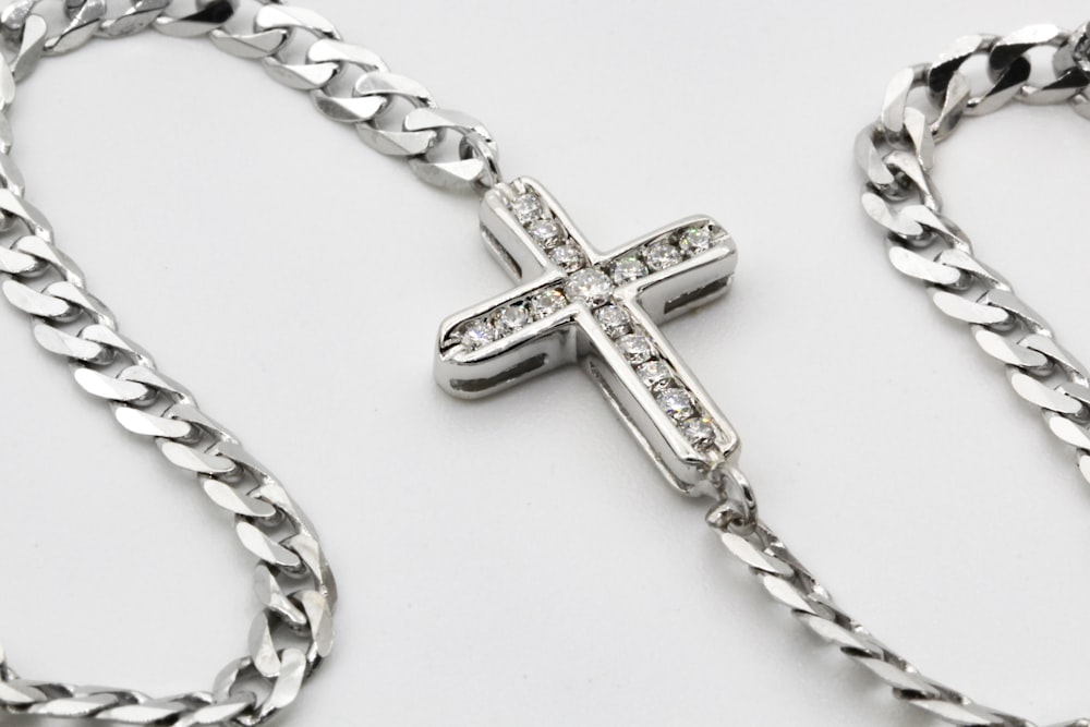 silver and gold cross pendant necklace