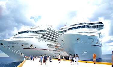 white cruise ship on dock during daytime