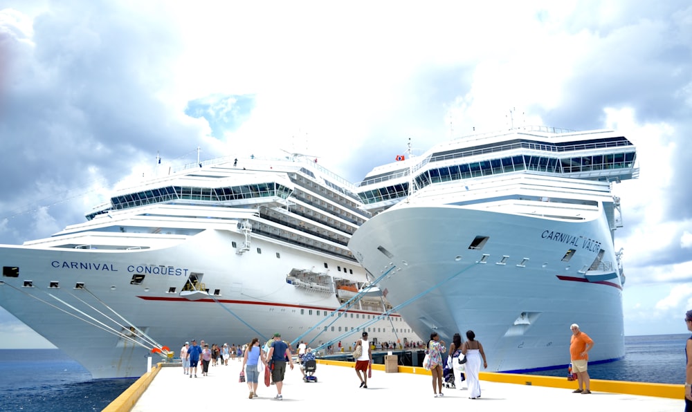 white cruise ship on dock during daytime