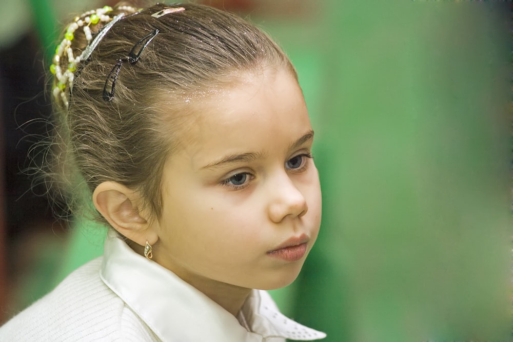 girl in white collared shirt