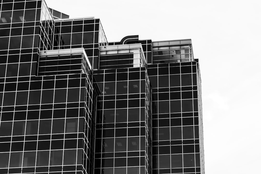 grayscale photo of high rise building