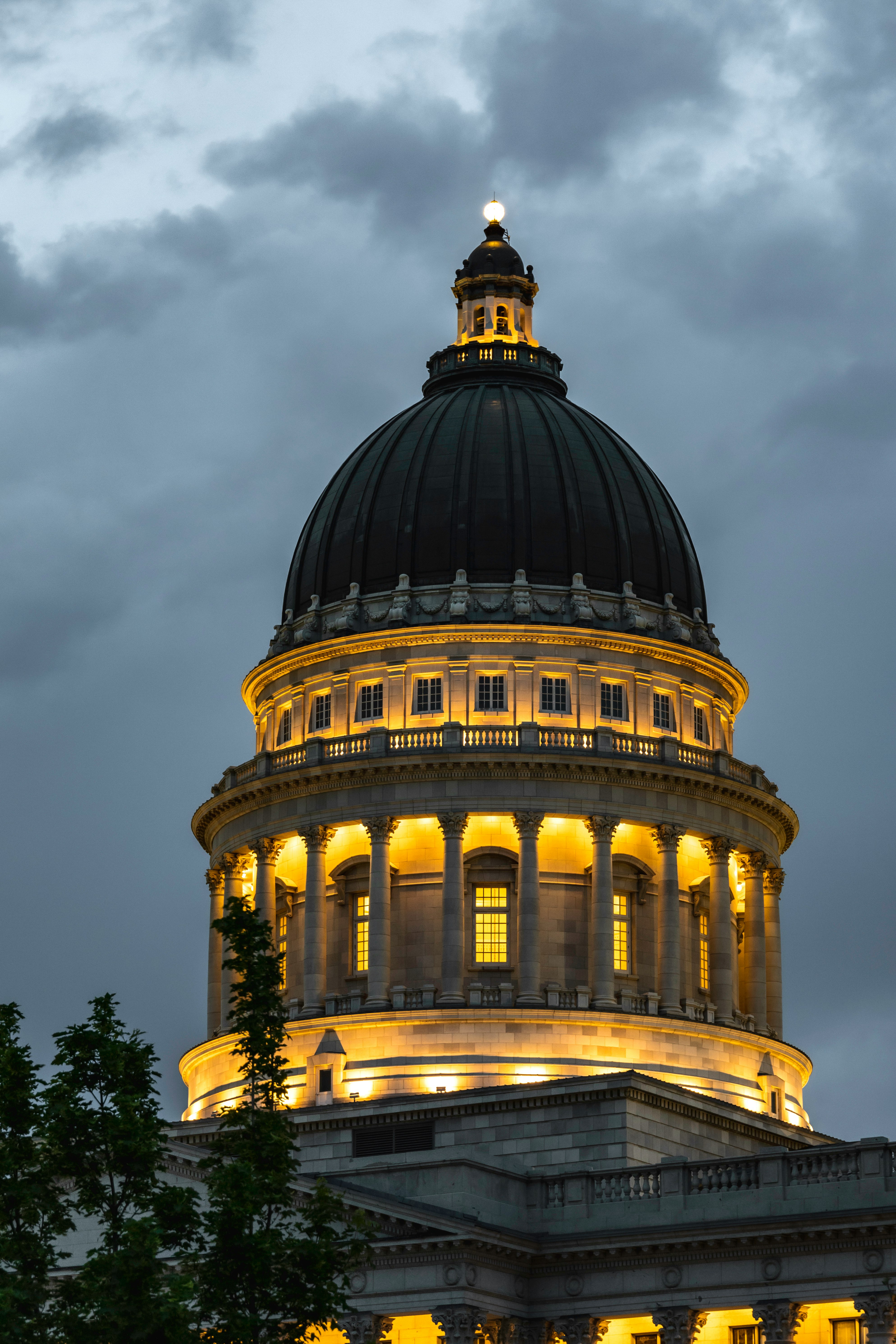 brown concrete building under cloudy sky during daytime