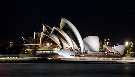 sydney opera house in australia during night time in Sydney Opera House Australia