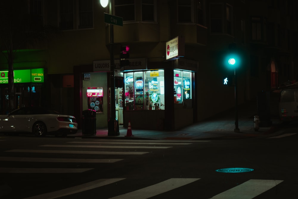 black and red lighted store signage